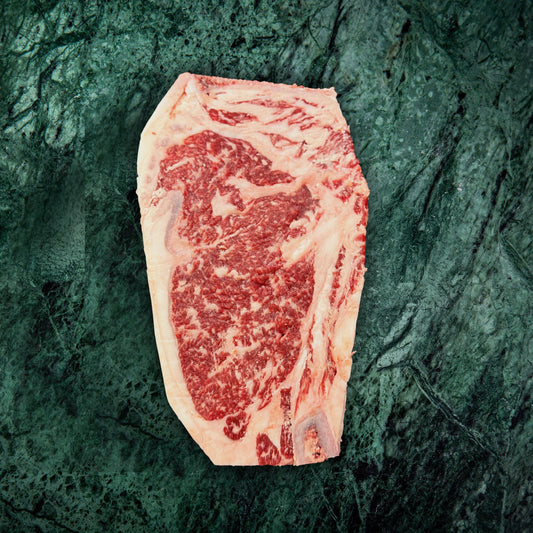 Australian Wagyu 9+MB Beef Bone In Striploin Steak - Prime Gourmet Online